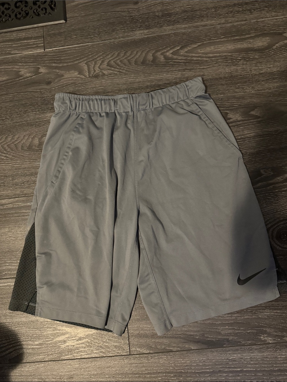 Nike Men’s Gray Athletic Shorts with Black Swoosh Accent